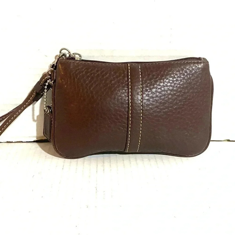Coach brown pebbled leather wristlet bag